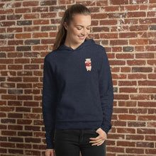 Load image into Gallery viewer, Person wearing Navy blue hoodie featuring a small Baron Von Swine pig mascot graphic on the chest, displayed flat against a reddish-brown textured brick wall background. The hoodie is centered and well-lit for a realistic
