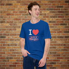 Load image into Gallery viewer, I Love Rudy&#39;s blue unisex T‑shirt with Rudy&#39;s Bar &amp; Grill logo on model