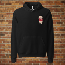 Load image into Gallery viewer, Front view of Rudy’s Bar Back Hoodie in black with Baron Von Swine mascot chest logo, shown against a brick wall background