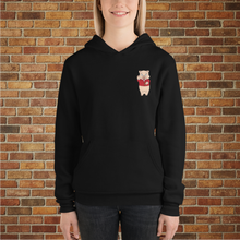 Load image into Gallery viewer, Model wearing Rudy’s Bar Back Hoodie in black, featuring Baron Von Swine mascot chest logo, brick wall background