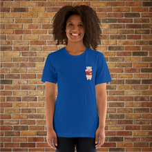 Load image into Gallery viewer, Front of Rudy’s Bar &amp; Grill Bar Back T-Shirt in royal blue, worn by a female model, featuring the Baron Von Swine mascot, displayed against a brick wall background