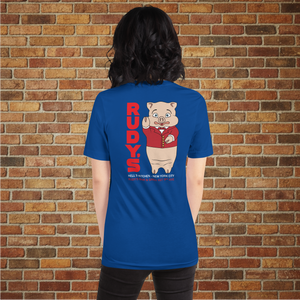 Model showing the back of Classic Rudy’s Bar & Grill true royal blue t-shirt, featuring Baron Von Swine mascot and red Rudy’s text, brick wall background