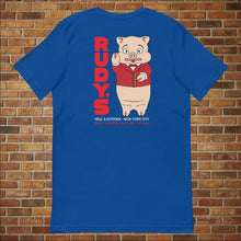 Load image into Gallery viewer, Classic Rudy’s Bar &amp; Grill true royal blue t-shirt laid flat, back view featuring Baron Von Swine mascot and red Rudy’s text, brick wall background
