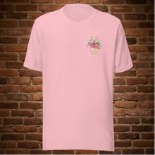 Load image into Gallery viewer, Ghost mockup of Rudy’s Bar &amp; Grill pink t-shirt with Cupid Pig graphic on front, floating in front of a brick wall