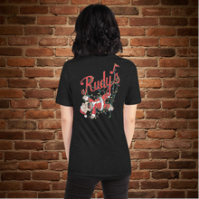 Load image into Gallery viewer, Back view of woman wearing Rudy’s Bar &amp; Grill Baron Von Swine Christmas Light Edition T-shirt in black heather, featuring Baron Von Swine mascot tangled in Christmas lights with Rudy’s script