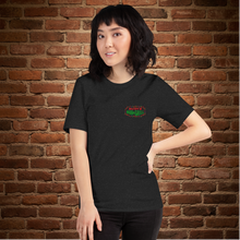 Load image into Gallery viewer, Woman wearing Rudy’s Bar &amp; Grill Baron Von Swine Christmas Light Edition T-shirt in black heather, front view with Rudy’s Bar &amp; Grill logo on chest