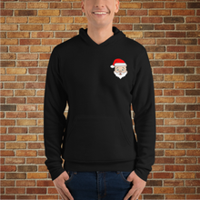 Load image into Gallery viewer, Front view of black Rudy’s Bar &amp; Grill holiday hoodie with Baron Von Swine in a Santa hat, shown on a smiling male model