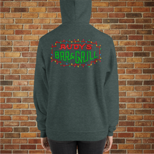 Load image into Gallery viewer, Back view of Heather Forest Rudy’s Bar &amp; Grill holiday hoodie featuring the neon bar sign with Christmas lights, worn by a female model