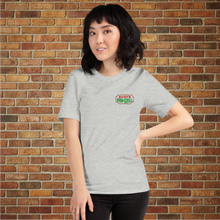 Load image into Gallery viewer, Person wearing Rudy&#39;s Bar &amp; Grill classic Christmas T-shirt front logo in Hell&#39;s Kitchen NYC