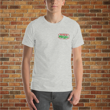 Load image into Gallery viewer, Man wearing Rudy&#39;s Bar &amp; Grill classic Christmas T-shirt with front logo in Hell&#39;s Kitchen NYC