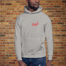 Load image into Gallery viewer, Carbon grey Rudy&#39;s Bar &amp; Grill unisex hoodie on model in front of brick wall background