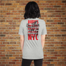 Load image into Gallery viewer, Woman wearing Rudy&#39;s Bar &amp; Grill NYC dive bar unisex T‑shirt with back graphic in athletic heather