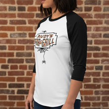 Load image into Gallery viewer, Woman wearing a white and black raglan 3/4 sleeve shirt with Rudy’s Bar &amp; Grill Halloween spider web logo, standing in front of a reddish-brown brick wall.