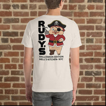 Load image into Gallery viewer, Model wearing Rudy’s Bar &amp; Grill heather dust Halloween t-shirt showing back design with Baron Von Swine as pirate, Hell’s Kitchen NYC