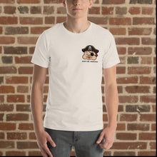 Load image into Gallery viewer, Model wearing Rudy’s Bar &amp; Grill heather dust Halloween t-shirt with pirate Baron Von Swine and “Ahoy Me, Hearties!” text on front, Hell’s Kitchen NYC