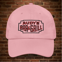 Load image into Gallery viewer, Front view of Rudy’s Bar &amp; Grill pink dad hat with neon sign logo, NYC bar merch, Valentine’s Day
