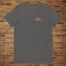 Load image into Gallery viewer, Rudy’s Bar &amp; Grill Saxophone Pig T-shirt in asphalt gray, front view, flat lay on brick wall background, showing Rudy’s Bar &amp; Grill logo on the chest.