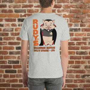 Rudy’s Bar & Grill Halloween edition t-shirt with vampire pig graphic shown on model, brick wall background