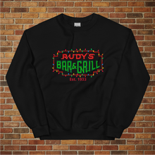 Load image into Gallery viewer, Rudy’s Bar &amp; Grill Christmas Neon Sign Sweatshirt flat lay, black, holiday lights design, brick wall background