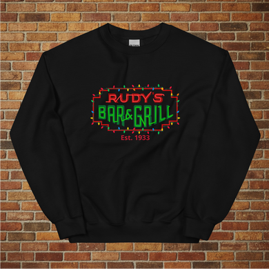 Rudy’s Bar & Grill Christmas Neon Sign Sweatshirt flat lay, black, holiday lights design, brick wall background
