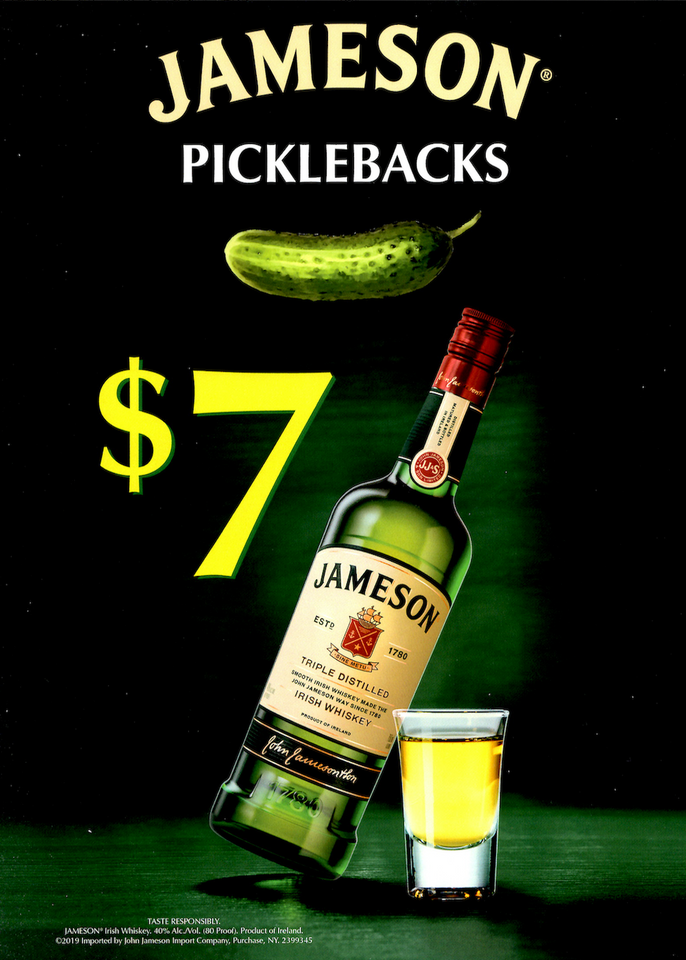 Jameson Pickleback shot special poster at Rudy’s Bar & Grill in NYC, featuring Jameson Irish Whiskey and pickle juice for $7