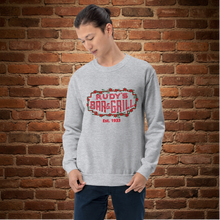 Load image into Gallery viewer, Person wearing grey Rudy’s Bar &amp; Grill neon sign Valentine’s Day sweatshirt in front of brick wall