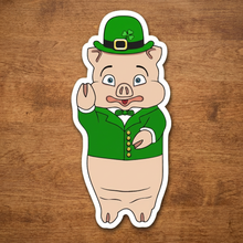 Load image into Gallery viewer, St. Patrick’s Day pig sticker featuring Rudy’s Bar &amp; Grill mascot Baron Von Swine