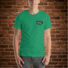 Load image into Gallery viewer, Rudy’s Bar &amp; Grill NYC St. Patrick’s Day t-shirt in kelly green, Baron Von Swine design, front view (alternate mockup)