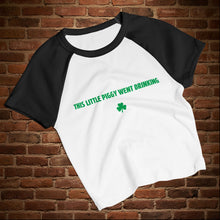 Load image into Gallery viewer, Rudy’s Bar NYC “This Little Piggy Went Drinking” St. Paddy’s baby tee, white with black raglan sleeves, front view