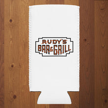 Load image into Gallery viewer, White slim can cooler featuring Rudy’s Bar &amp; Grill neon sign logo on wood background