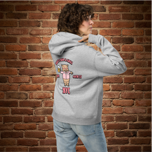 Load image into Gallery viewer, Woman wearing Rudy’s Bar &amp; Grill Valentine’s Day NYC Edition oversized hoodie, back view – Baron Von Swine graphic and NYC text on athletic heather gray, brick wall background