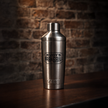Load image into Gallery viewer, Red Rudy’s Bar &amp; Grill YETI cocktail shaker on a wooden bar with exposed brick background.