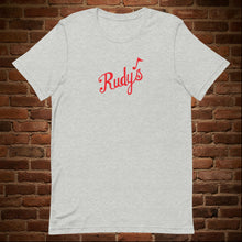 Load image into Gallery viewer, Vintage Rudy&#39;s Bar &amp; Grill unisex t-shirt in athletic heather on brick wall background