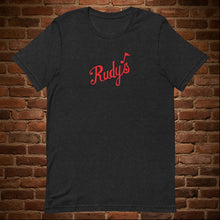 Load image into Gallery viewer, Vintage Rudy&#39;s Bar &amp; Grill unisex t-shirt in black heather on brick wall background