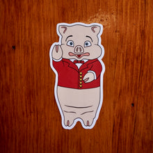 Load image into Gallery viewer, Classic Rudy’s pig sticker bar logo decal on wood background in Hell’s Kitchen NYC