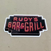 Load image into Gallery viewer, Rudy’s Bar &amp; Grill neon sign sticker displayed on a light concrete surface