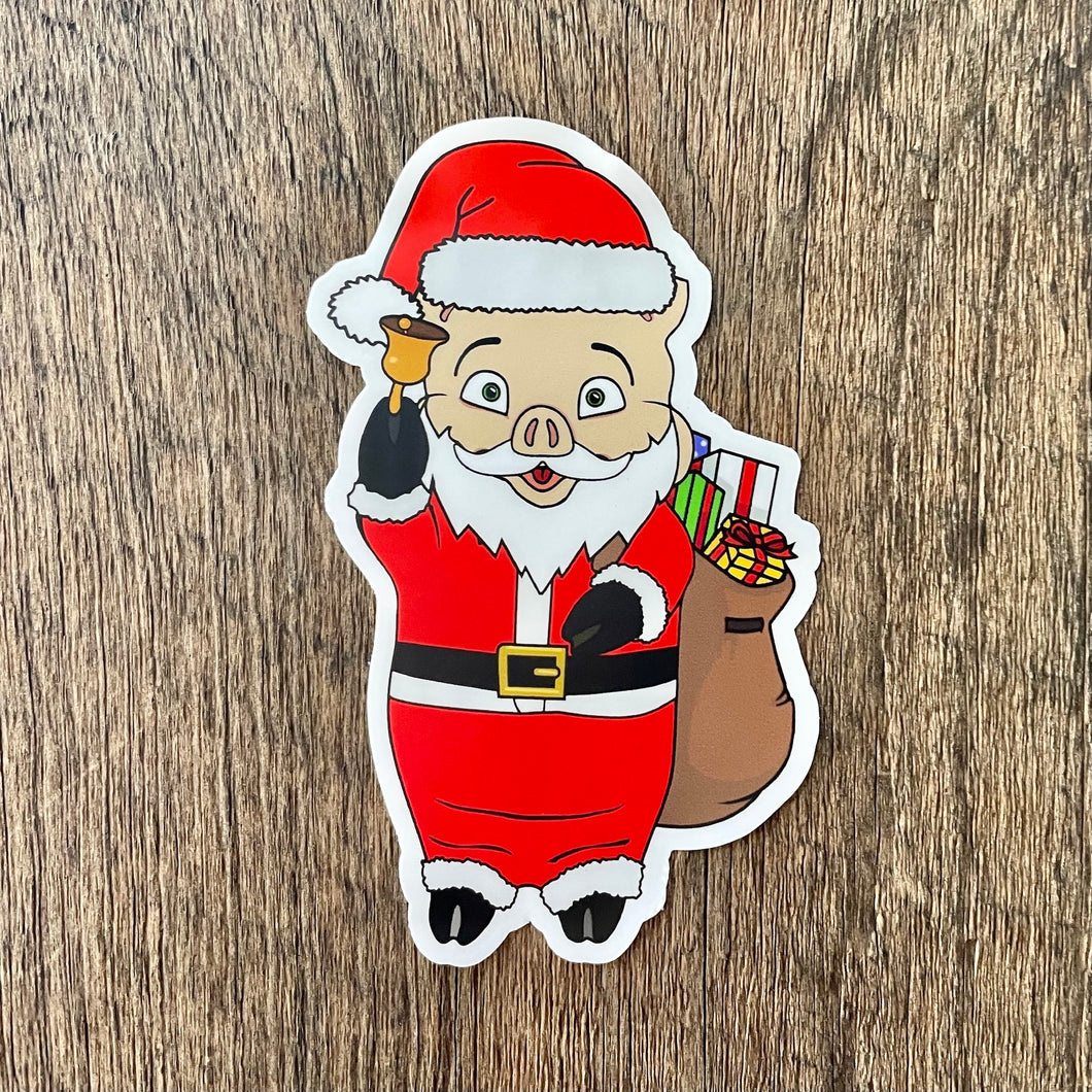 Rudy’s Bar & Grill Santa pig holiday sticker with Baron Von Swine on rustic wood background